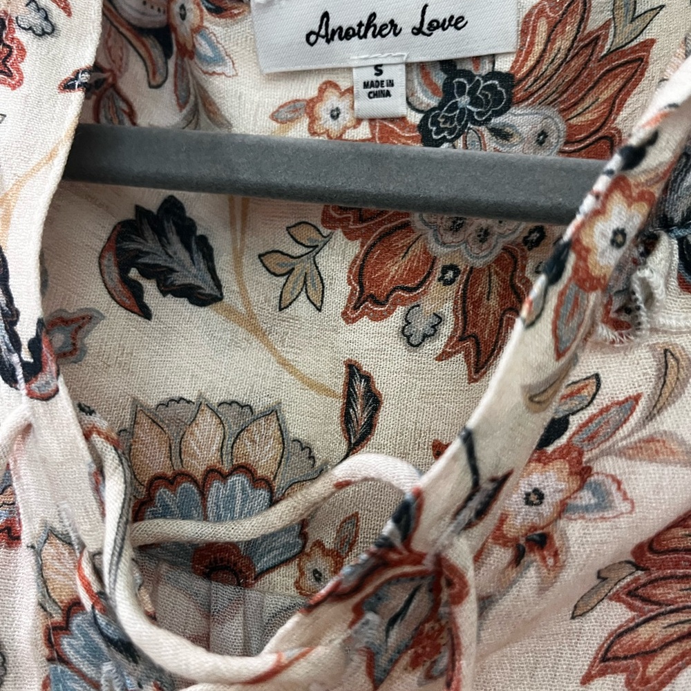 Another Love Cream dress with Rust and Blue Floral Design